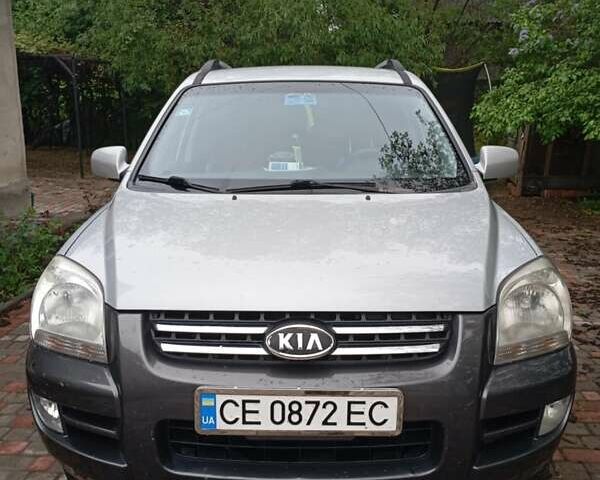 Серый Киа Sportage, объемом двигателя 2 л и пробегом 200 тыс. км за 6500 $, фото 1 на Automoto.ua