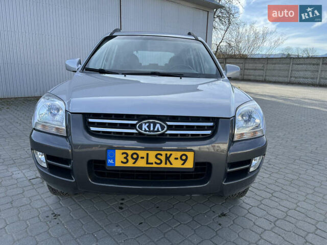 Сірий Кіа Sportage, об'ємом двигуна 2 л та пробігом 162 тис. км за 6950 $, фото 1 на Automoto.ua