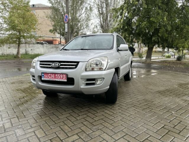 Сірий Кіа Sportage, об'ємом двигуна 2 л та пробігом 200 тис. км за 8000 $, фото 1 на Automoto.ua