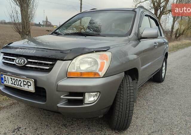 Сірий Кіа Sportage, об'ємом двигуна 2 л та пробігом 160 тис. км за 7900 $, фото 1 на Automoto.ua