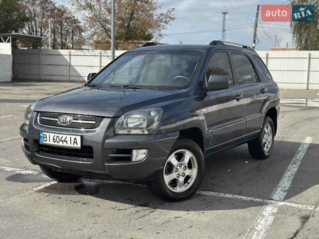 Серый Киа Sportage, объемом двигателя 2 л и пробегом 250 тыс. км за 7500 $, фото 1 на Automoto.ua