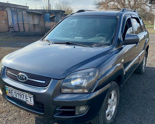 Серый Киа Sportage, объемом двигателя 2 л и пробегом 261 тыс. км за 6700 $, фото 1 на Automoto.ua