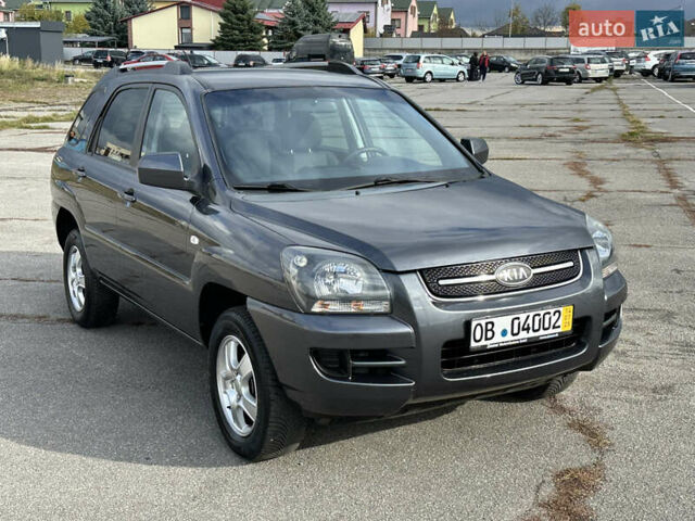 Серый Киа Sportage, объемом двигателя 2 л и пробегом 167 тыс. км за 7600 $, фото 1 на Automoto.ua