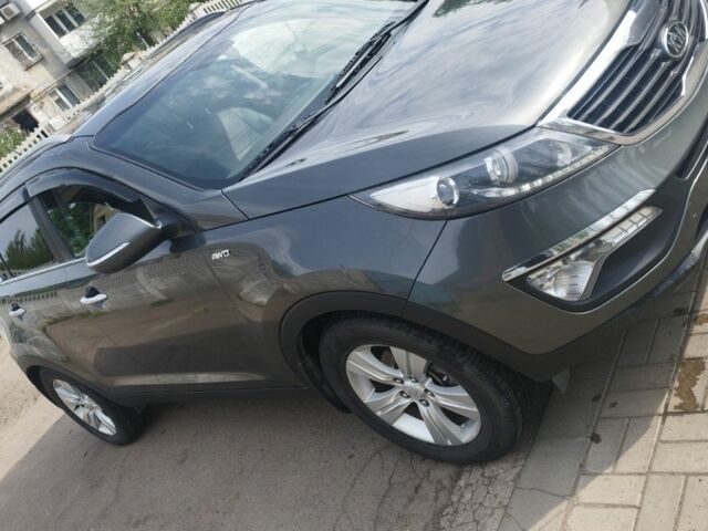 Серый Киа Sportage, объемом двигателя 2 л и пробегом 210 тыс. км за 19980 $, фото 1 на Automoto.ua