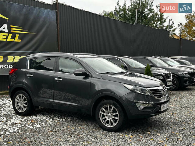 Серый Киа Sportage, объемом двигателя 2 л и пробегом 208 тыс. км за 12400 $, фото 1 на Automoto.ua