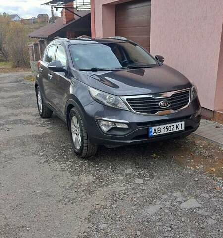 Серый Киа Sportage, объемом двигателя 2 л и пробегом 214 тыс. км за 12000 $, фото 1 на Automoto.ua