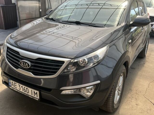 Серый Киа Sportage, объемом двигателя 2 л и пробегом 130 тыс. км за 12799 $, фото 1 на Automoto.ua