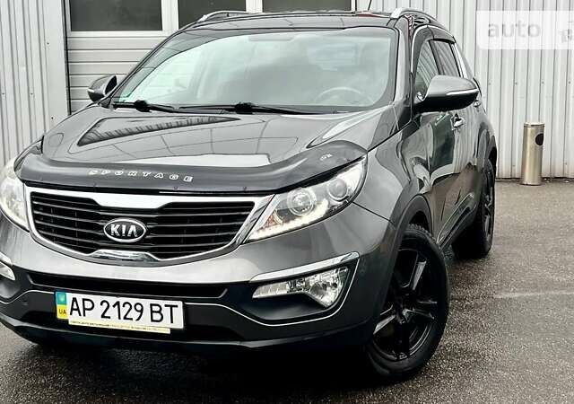 Серый Киа Sportage, объемом двигателя 2 л и пробегом 185 тыс. км за 12900 $, фото 1 на Automoto.ua