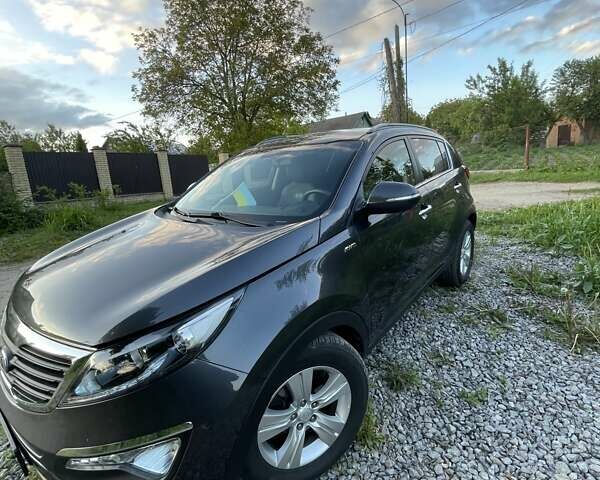 Серый Киа Sportage, объемом двигателя 2 л и пробегом 167 тыс. км за 14000 $, фото 1 на Automoto.ua