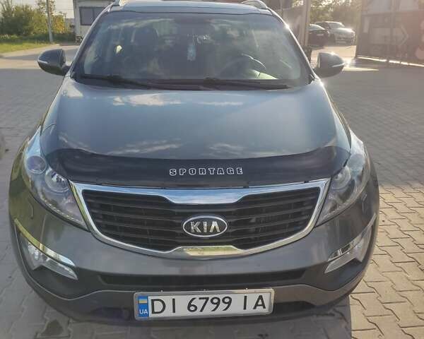 Серый Киа Sportage, объемом двигателя 2 л и пробегом 182 тыс. км за 14650 $, фото 1 на Automoto.ua