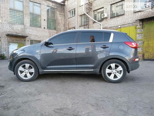 Серый Киа Sportage, объемом двигателя 2 л и пробегом 84 тыс. км за 13800 $, фото 1 на Automoto.ua