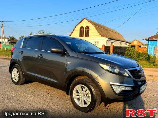 Серый Киа Sportage, объемом двигателя 2 л и пробегом 141 тыс. км за 12850 $, фото 1 на Automoto.ua