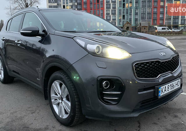 Серый Киа Sportage, объемом двигателя 2 л и пробегом 209 тыс. км за 18500 $, фото 1 на Automoto.ua