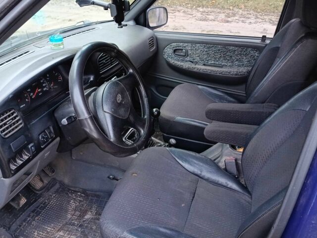 Синий Киа Sportage, объемом двигателя 2 л и пробегом 210 тыс. км за 3300 $, фото 1 на Automoto.ua