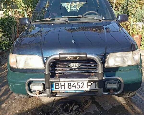 Синий Киа Sportage, объемом двигателя 2 л и пробегом 250 тыс. км за 2999 $, фото 1 на Automoto.ua