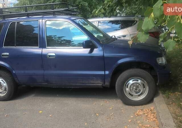 Синий Киа Sportage, объемом двигателя 2 л и пробегом 330 тыс. км за 3999 $, фото 1 на Automoto.ua