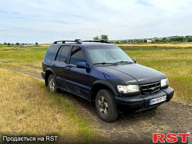 Синій Кіа Sportage, об'ємом двигуна 2 л та пробігом 200 тис. км за 3500 $, фото 1 на Automoto.ua