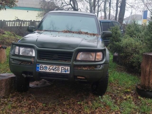 Синий Киа Sportage, объемом двигателя 2 л и пробегом 100 тыс. км за 1200 $, фото 1 на Automoto.ua