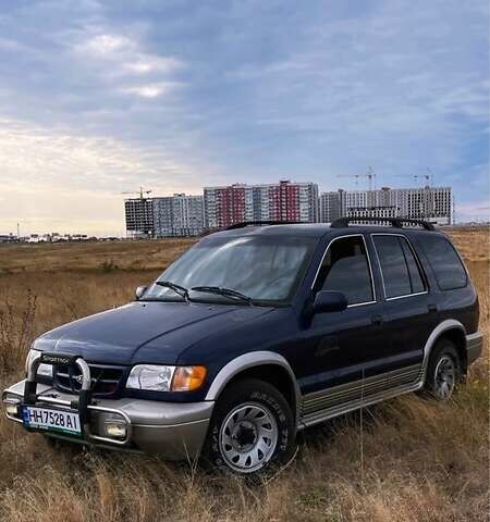 Синий Киа Sportage, объемом двигателя 2 л и пробегом 140 тыс. км за 2200 $, фото 1 на Automoto.ua