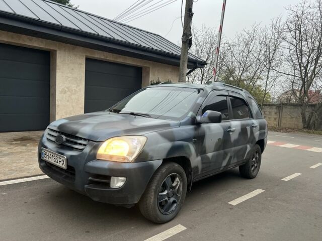 Синий Киа Sportage, объемом двигателя 2 л и пробегом 200 тыс. км за 4300 $, фото 1 на Automoto.ua
