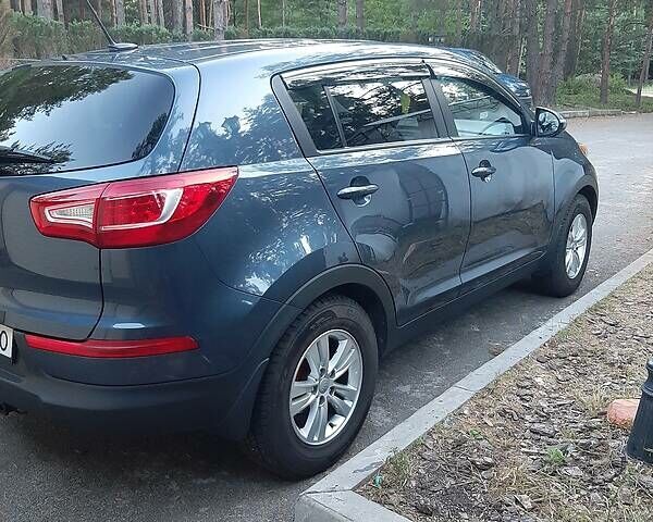 Синий Киа Sportage, объемом двигателя 2.4 л и пробегом 220 тыс. км за 12000 $, фото 1 на Automoto.ua