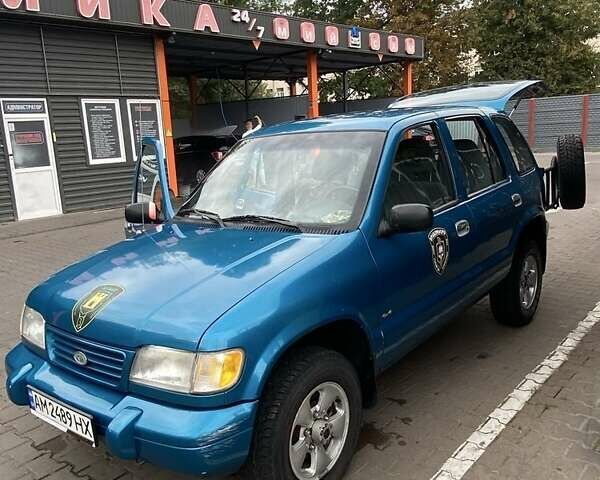 Зеленый Киа Sportage, объемом двигателя 2 л и пробегом 222 тыс. км за 2800 $, фото 1 на Automoto.ua