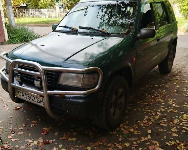 Зеленый Киа Sportage, объемом двигателя 2 л и пробегом 333 тыс. км за 3200 $, фото 1 на Automoto.ua