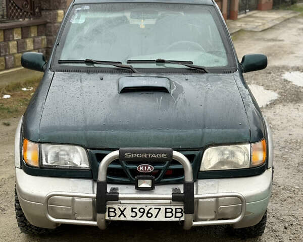 Зеленый Киа Sportage, объемом двигателя 2 л и пробегом 300 тыс. км за 3700 $, фото 1 на Automoto.ua