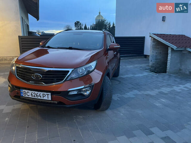 Оранжевый Киа Sportage, объемом двигателя 2 л и пробегом 282 тыс. км за 13400 $, фото 1 на Automoto.ua