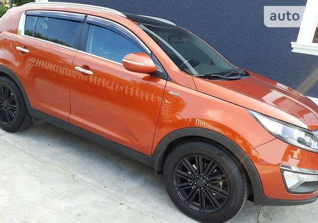 Помаранчевий Кіа Sportage, об'ємом двигуна 2 л та пробігом 128 тис. км за 15700 $, фото 1 на Automoto.ua