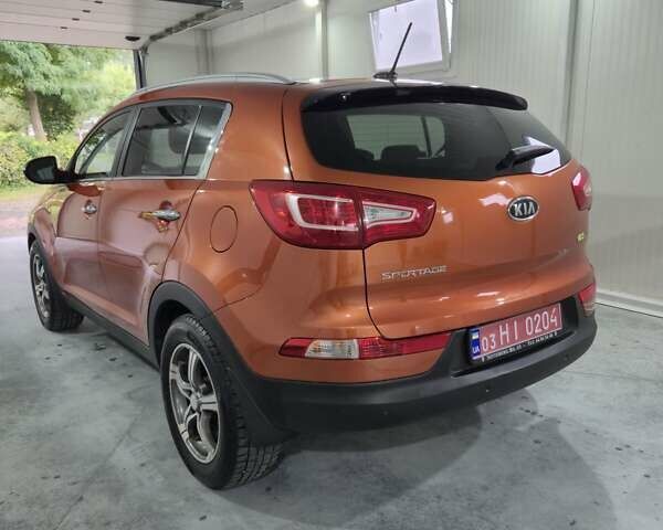 Оранжевый Киа Sportage, объемом двигателя 1.6 л и пробегом 220 тыс. км за 11200 $, фото 1 на Automoto.ua
