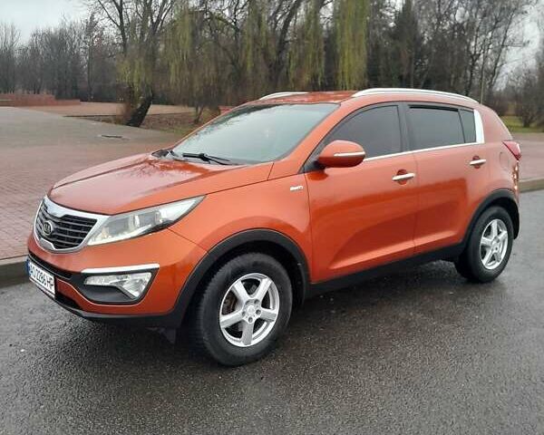 Помаранчевий Кіа Sportage, об'ємом двигуна 2 л та пробігом 218 тис. км за 12700 $, фото 1 на Automoto.ua