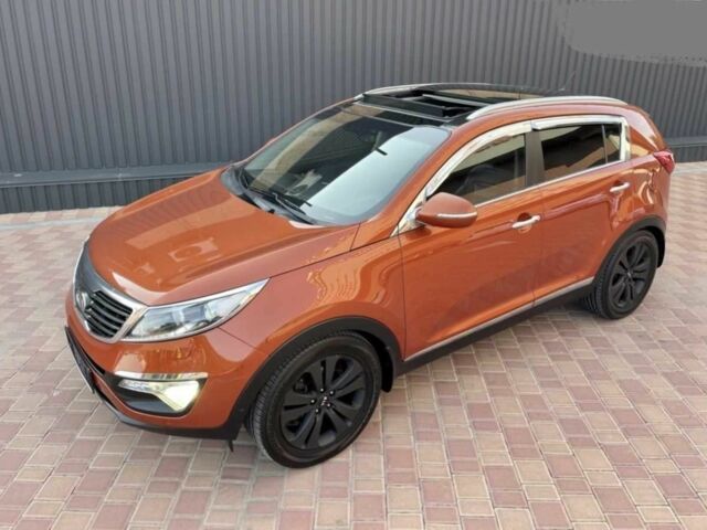 Помаранчевий Кіа Sportage, об'ємом двигуна 2 л та пробігом 180 тис. км за 11500 $, фото 1 на Automoto.ua