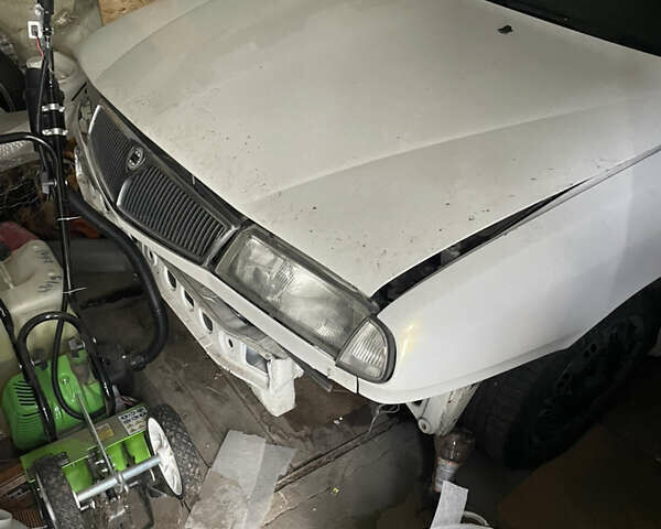 Білий Лянча Delta, об'ємом двигуна 1.9 л та пробігом 478 тис. км за 407 $, фото 1 на Automoto.ua