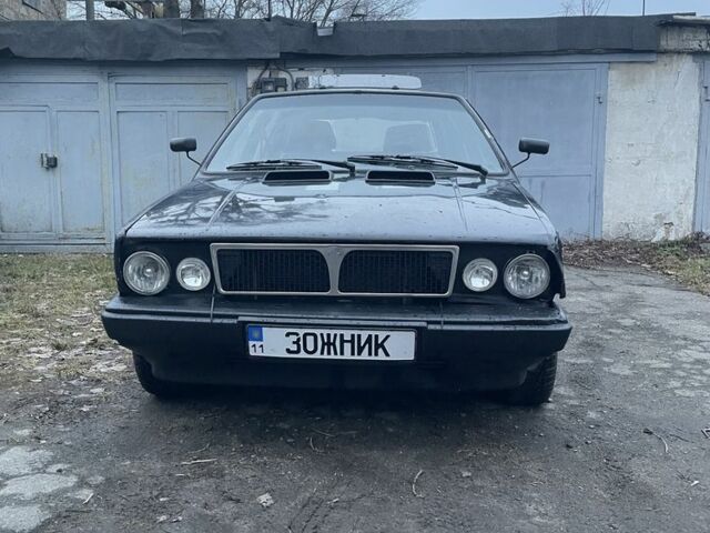 Чорний Лянча Delta, об'ємом двигуна 1.6 л та пробігом 100 тис. км за 1003 $, фото 1 на Automoto.ua