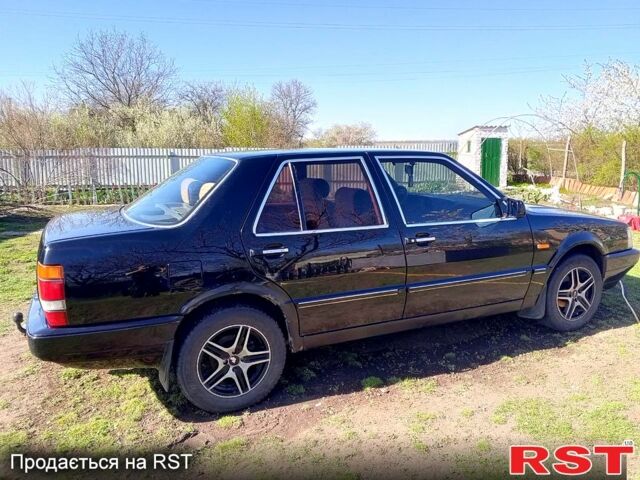 Чорний Лянча Thema, об'ємом двигуна 2 л та пробігом 200 тис. км за 1200 $, фото 1 на Automoto.ua
