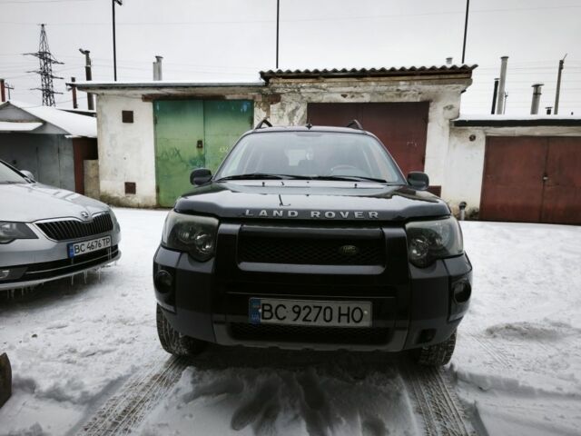 Чорний Ленд Ровер Дефендер, об'ємом двигуна 2 л та пробігом 113 тис. км за 7800 $, фото 1 на Automoto.ua