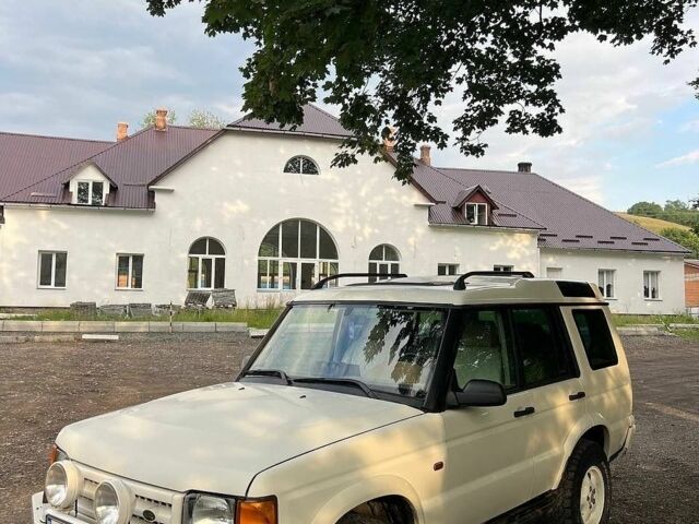 Білий Ленд Ровер Діскавері, об'ємом двигуна 2.5 л та пробігом 241 тис. км за 12500 $, фото 1 на Automoto.ua