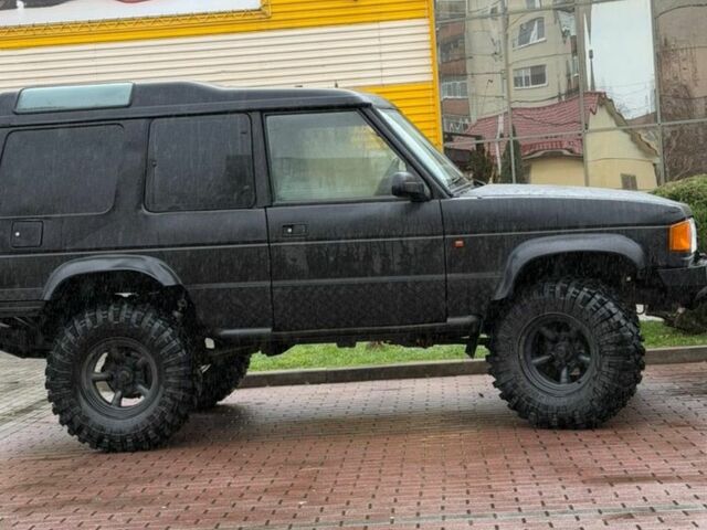 Чорний Ленд Ровер Діскавері, об'ємом двигуна 2.5 л та пробігом 267 тис. км за 12850 $, фото 1 на Automoto.ua