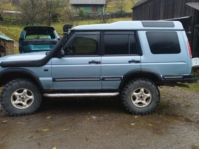 Синий Ленд Ровер Дискавери, объемом двигателя 2.5 л и пробегом 300 тыс. км за 10500 $, фото 1 на Automoto.ua