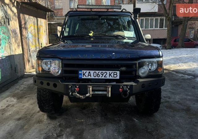 Синій Ленд Ровер Діскавері, об'ємом двигуна 2.5 л та пробігом 343 тис. км за 12000 $, фото 1 на Automoto.ua