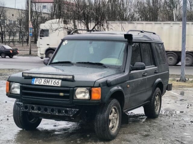 Зелений Ленд Ровер Діскавері, об'ємом двигуна 2.5 л та пробігом 322 тис. км за 3600 $, фото 1 на Automoto.ua
