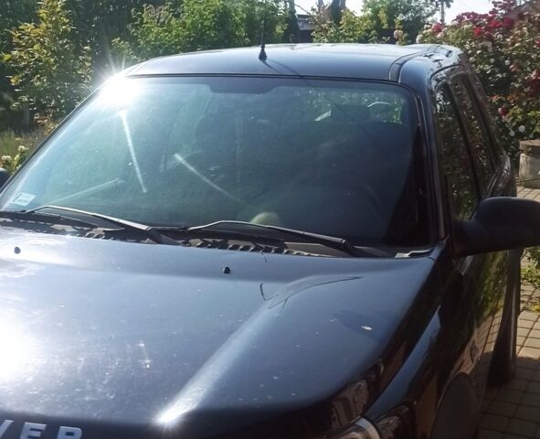 Чорний Ленд Ровер Freelander, об'ємом двигуна 1.8 л та пробігом 164 тис. км за 5000 $, фото 1 на Automoto.ua
