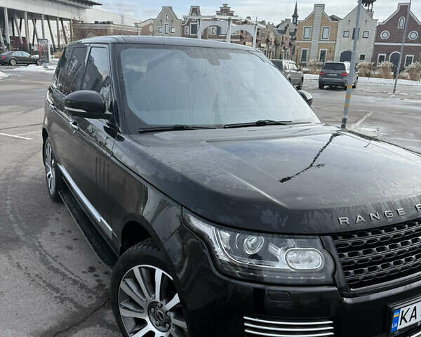 Черный Ленд Ровер Рендж Ровер, объемом двигателя 5 л и пробегом 250 тыс. км за 25000 $, фото 1 на Automoto.ua