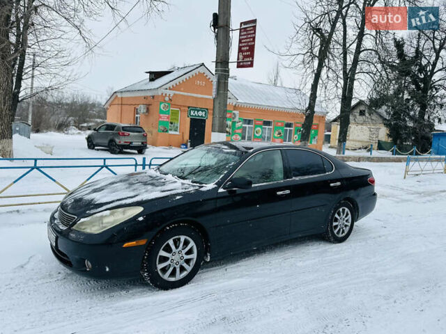 Черный Лексус ЕС, объемом двигателя 3 л и пробегом 211 тыс. км за 5499 $, фото 1 на Automoto.ua