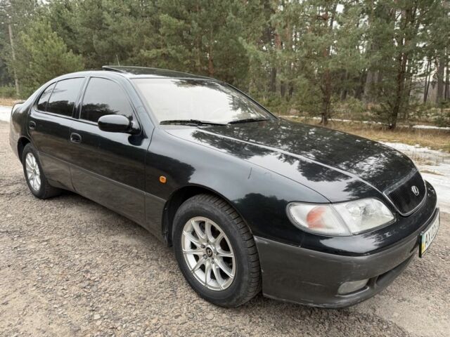 Черный Лексус ГХ, объемом двигателя 3 л и пробегом 162 тыс. км за 3950 $, фото 1 на Automoto.ua