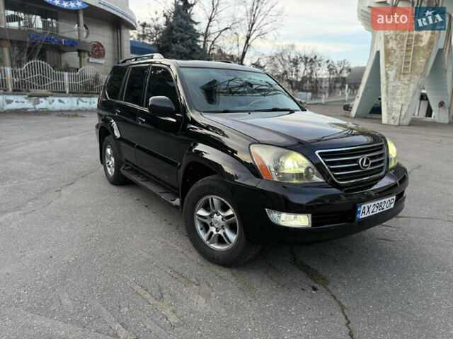Черный Лексус ГХ, объемом двигателя 4.66 л и пробегом 225 тыс. км за 11900 $, фото 1 на Automoto.ua