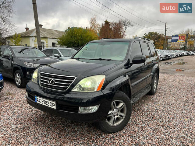 Черный Лексус ГХ, объемом двигателя 4.66 л и пробегом 223 тыс. км за 12700 $, фото 1 на Automoto.ua