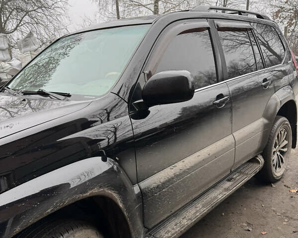 Черный Лексус ГХ, объемом двигателя 4.66 л и пробегом 300 тыс. км за 14000 $, фото 1 на Automoto.ua