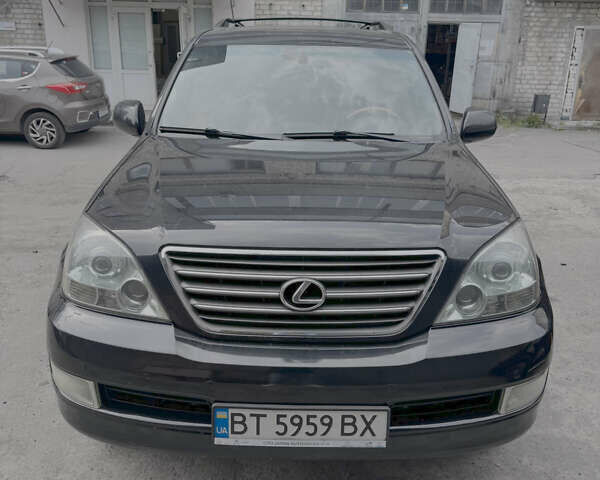 Черный Лексус ГХ, объемом двигателя 4.7 л и пробегом 260 тыс. км за 12600 $, фото 1 на Automoto.ua
